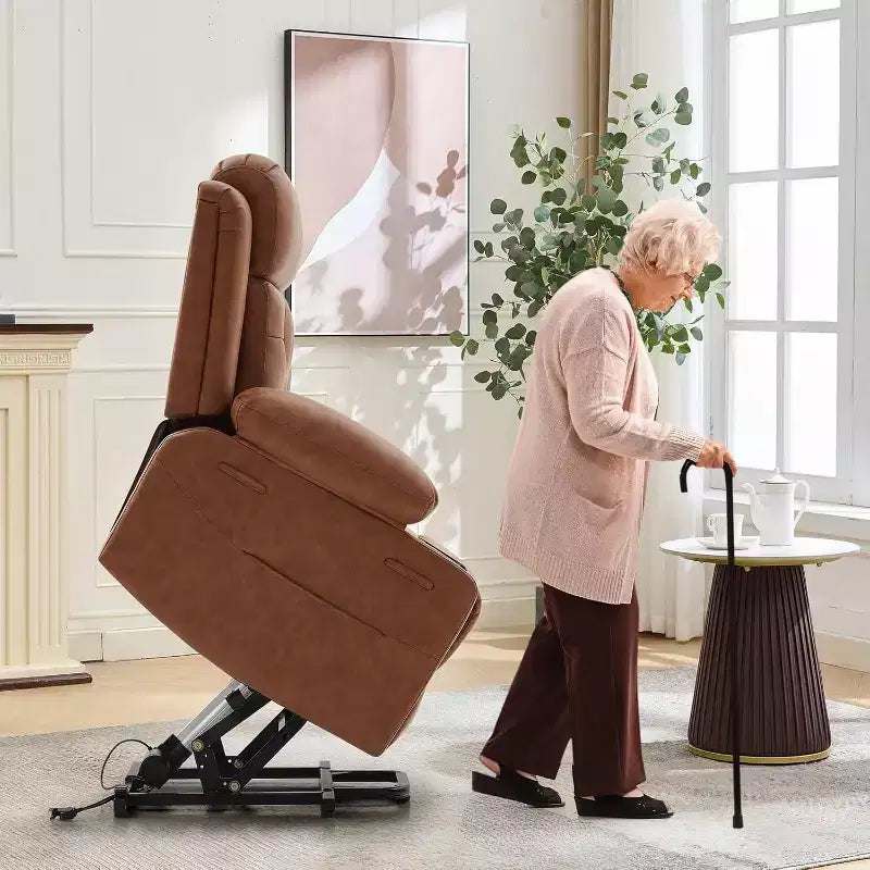 Le fauteuil inclinable de salon en cuir PU est équipé de fonctions de massage par vibration et de chauffage lombaire, et est livré avec des poches latérales et des porte-gobelets.
