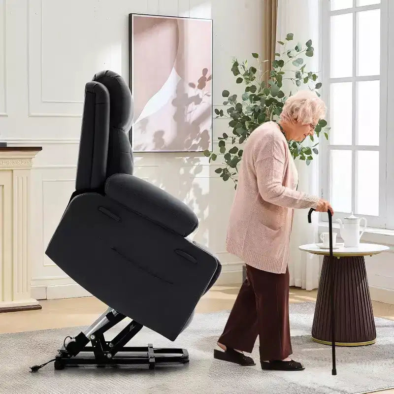 Le fauteuil inclinable de salon en cuir PU est équipé de fonctions de massage par vibration et de chauffage lombaire, et est livré avec des poches latérales et des porte-gobelets.